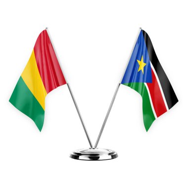 Two table flags isolated on white background 3d illustration, guinea and south sudan