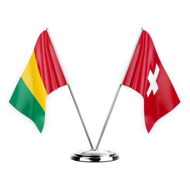 Two table flags isolated on white background 3d illustration, guinea and switzerland