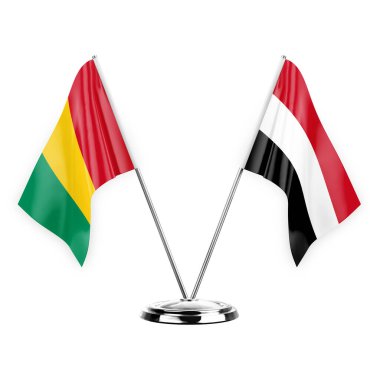 Two table flags isolated on white background 3d illustration, guinea and yemen