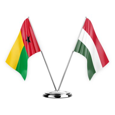 Two table flags isolated on white background 3d illustration, guinea-bissau and hungary