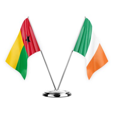 Two table flags isolated on white background 3d illustration, guinea-bissau and ireland