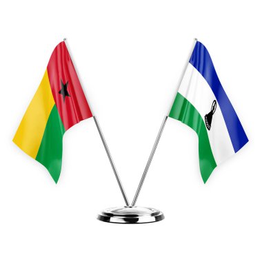 Two table flags isolated on white background 3d illustration, guinea-bissau and lesotho