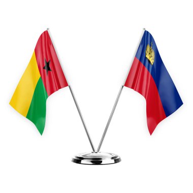 Two table flags isolated on white background 3d illustration, guinea-bissau and liechtenstein
