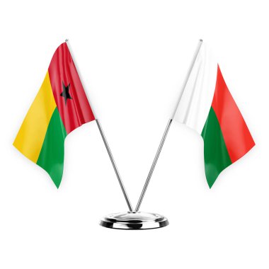 Two table flags isolated on white background 3d illustration, guinea-bissau and madagascar