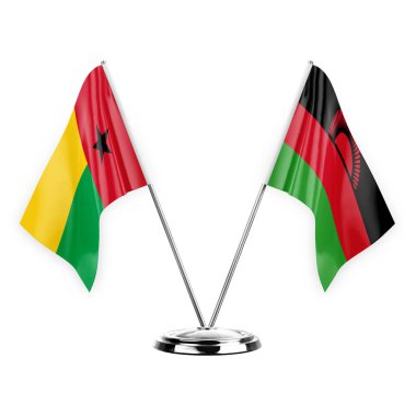 Two table flags isolated on white background 3d illustration, guinea-bissau and malawi