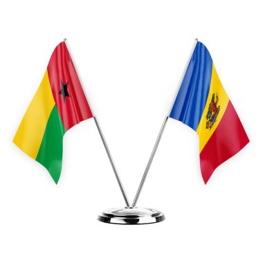 Two table flags isolated on white background 3d illustration, guinea-bissau and moldova
