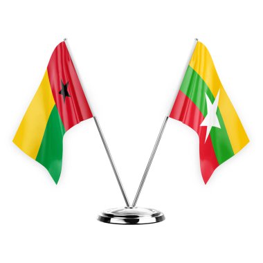 Two table flags isolated on white background 3d illustration, guinea-bissau and myanmar