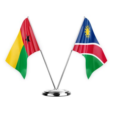 Two table flags isolated on white background 3d illustration, guinea-bissau and namibia