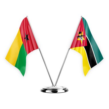Two table flags isolated on white background 3d illustration, guinea-bissau and mozambique