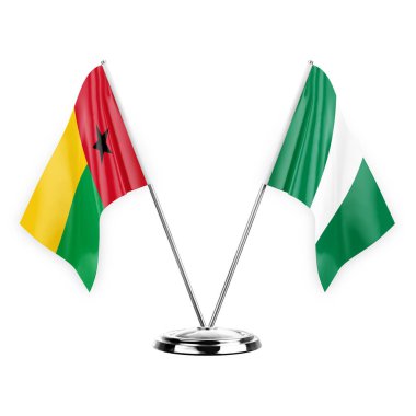 Two table flags isolated on white background 3d illustration, guinea-bissau and nigeria