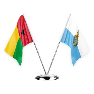 Two table flags isolated on white background 3d illustration, guinea-bissau and san marino