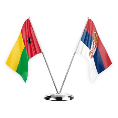 Two table flags isolated on white background 3d illustration, guinea-bissau and serbia