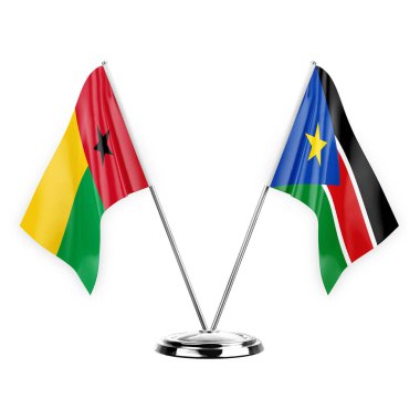 Two table flags isolated on white background 3d illustration, guinea-bissau and south sudan