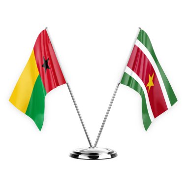 Two table flags isolated on white background 3d illustration, guinea-bissau and suriname