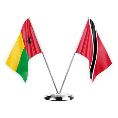 Two table flags isolated on white background 3d illustration, guinea-bissau and tobago