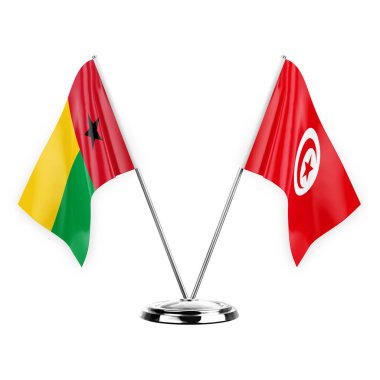 Two table flags isolated on white background 3d illustration, guinea-bissau and tunisia