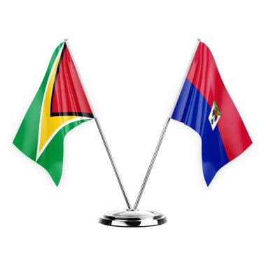 Two table flags isolated on white background 3d illustration, guyana and haiti
