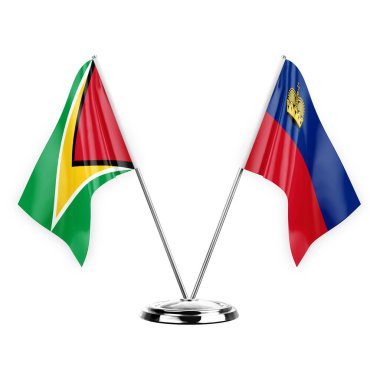 Two table flags isolated on white background 3d illustration, guyana and liechtenstein