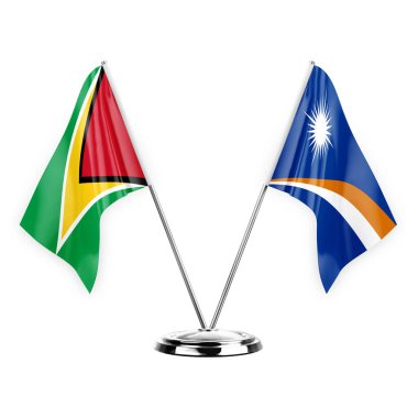 Two table flags isolated on white background 3d illustration, guyana and marshall islands