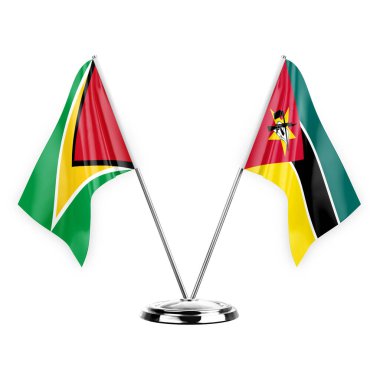Two table flags isolated on white background 3d illustration, guyana and mozambique