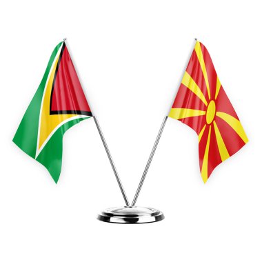 Two table flags isolated on white background 3d illustration, guyana and north macedonia