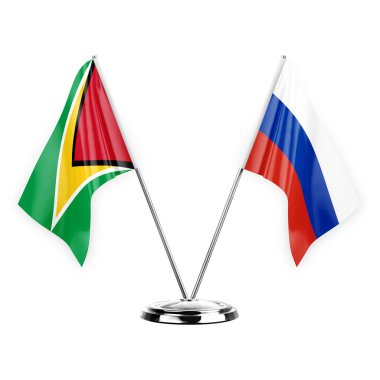 Two table flags isolated on white background 3d illustration, guyana and russia
