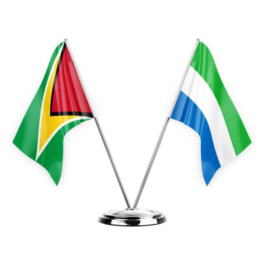 Two table flags isolated on white background 3d illustration, guyana and sierra leone