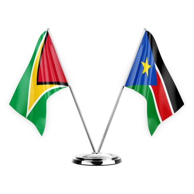 Two table flags isolated on white background 3d illustration, guyana and south sudan