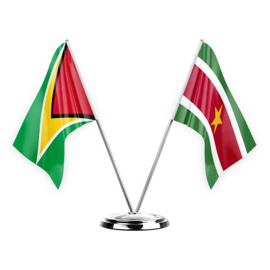 Two table flags isolated on white background 3d illustration, guyana and suriname