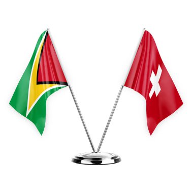 Two table flags isolated on white background 3d illustration, guyana and switzerland