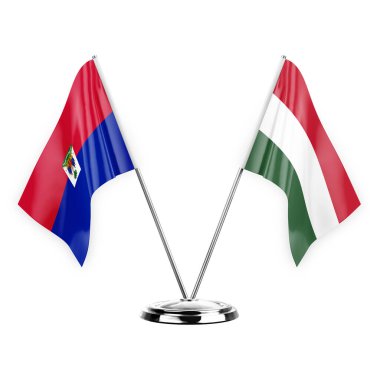 Two table flags isolated on white background 3d illustration, haiti and hungary