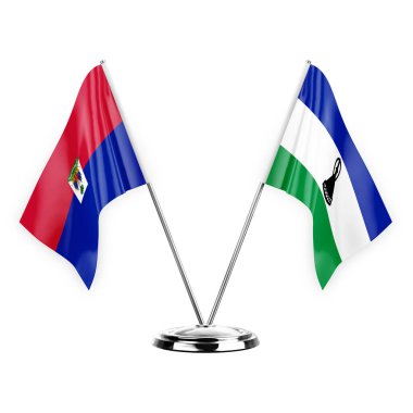 Two table flags isolated on white background 3d illustration, haiti and lesotho