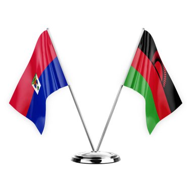 Two table flags isolated on white background 3d illustration, haiti and malawi