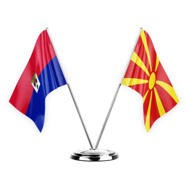 Two table flags isolated on white background 3d illustration, haiti and north macedonia