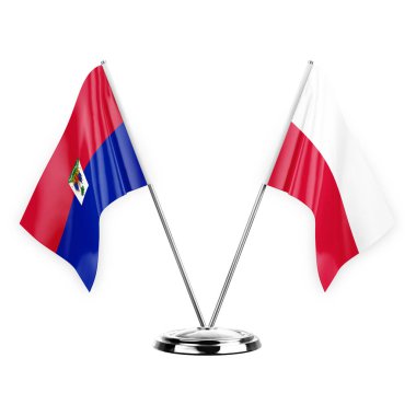 Two table flags isolated on white background 3d illustration, haiti and poland