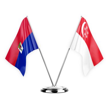 Two table flags isolated on white background 3d illustration, haiti and singapore