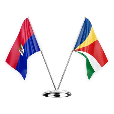 Two table flags isolated on white background 3d illustration, haiti and seychelles