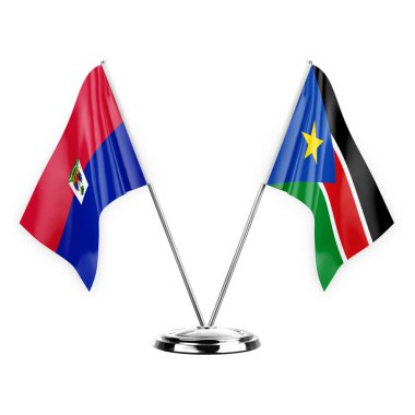 Two table flags isolated on white background 3d illustration, haiti and south sudan