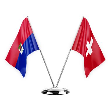 Two table flags isolated on white background 3d illustration, haiti and switzerland