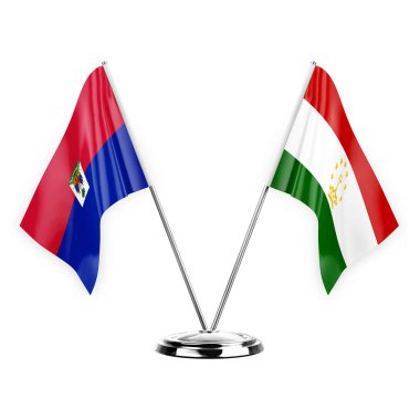Two table flags isolated on white background 3d illustration, haiti and tajikistan