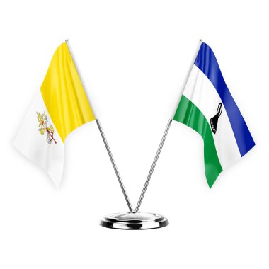 Two table flags isolated on white background 3d illustration, holy see and lesotho