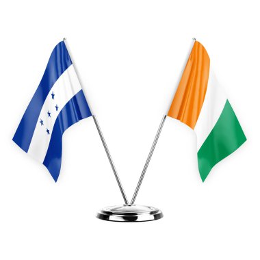 Two table flags isolated on white background 3d illustration, honduras and ivory coast