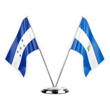 Two table flags isolated on white background 3d illustration, honduras and nicaragua