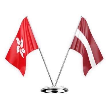 Two table flags isolated on white background 3d illustration, hong kong and latvia
