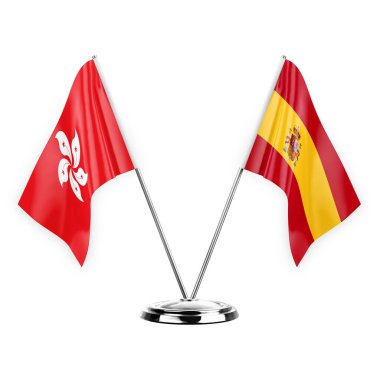 Two table flags isolated on white background 3d illustration, hong kong and spain