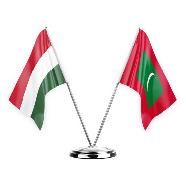 Two table flags isolated on white background 3d illustration, hungary and maldives