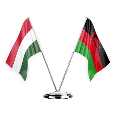 Two table flags isolated on white background 3d illustration, hungary and malawi