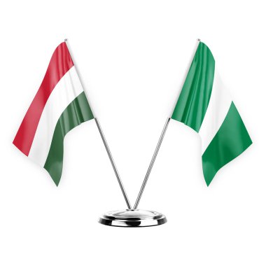 Two table flags isolated on white background 3d illustration, hungary and nigeria