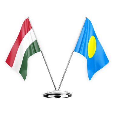 Two table flags isolated on white background 3d illustration, hungary and palau