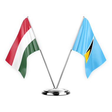 Two table flags isolated on white background 3d illustration, hungary and saint lucia